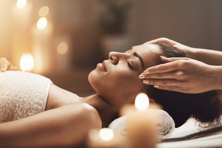 attractive african woman enjoying face massage spa salon compressed 1 768x512