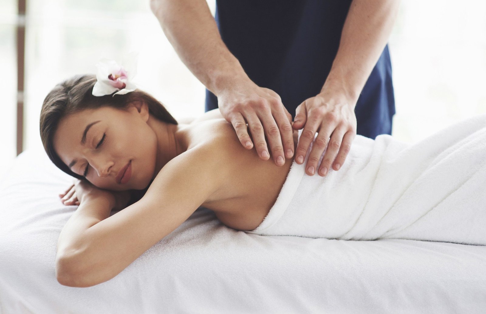 beautiful young woman relaxing with hand massage beauty spa compressed 3